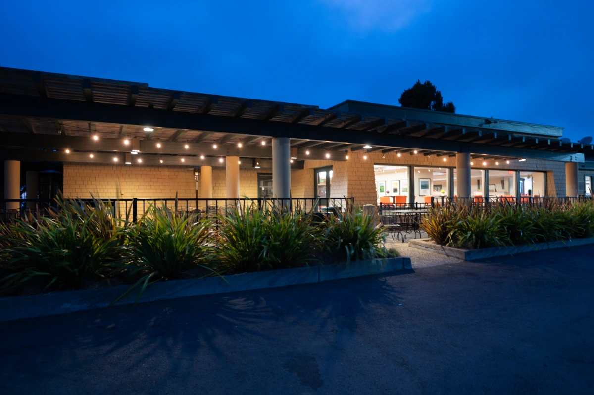 View of the patio lit up at dusk